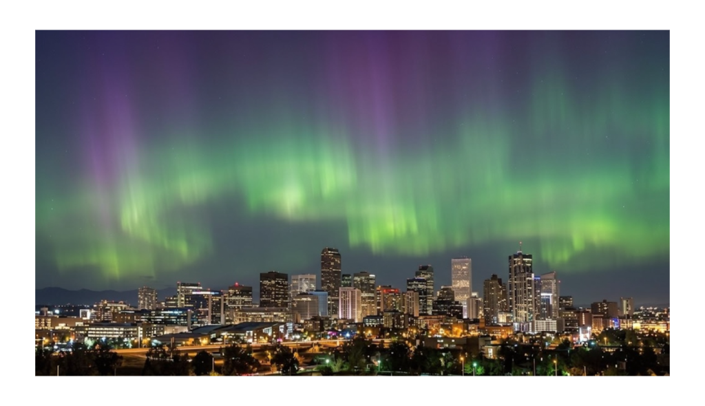 Beautiful glowing sky lights over a US city caused by the Solar Storm 2026