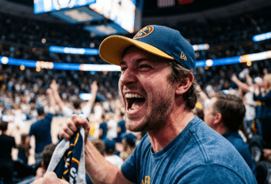 Excited fan reacting to NBA Playoffs 2026 upset