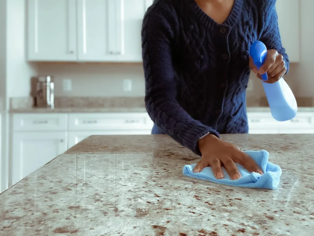 A person cleaning the kitchen to follow the egg recall warning today