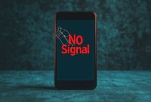 A mobile phone showing no service during the massive telecom network outage today