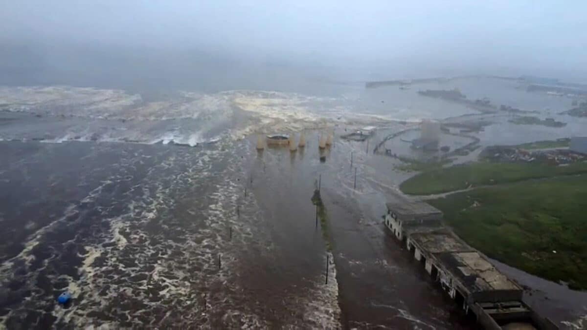 A massive tsunami warning causing huge dangerous waves near a coastal town