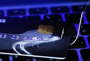 A dangerous hacker creating a bank data breach warning online