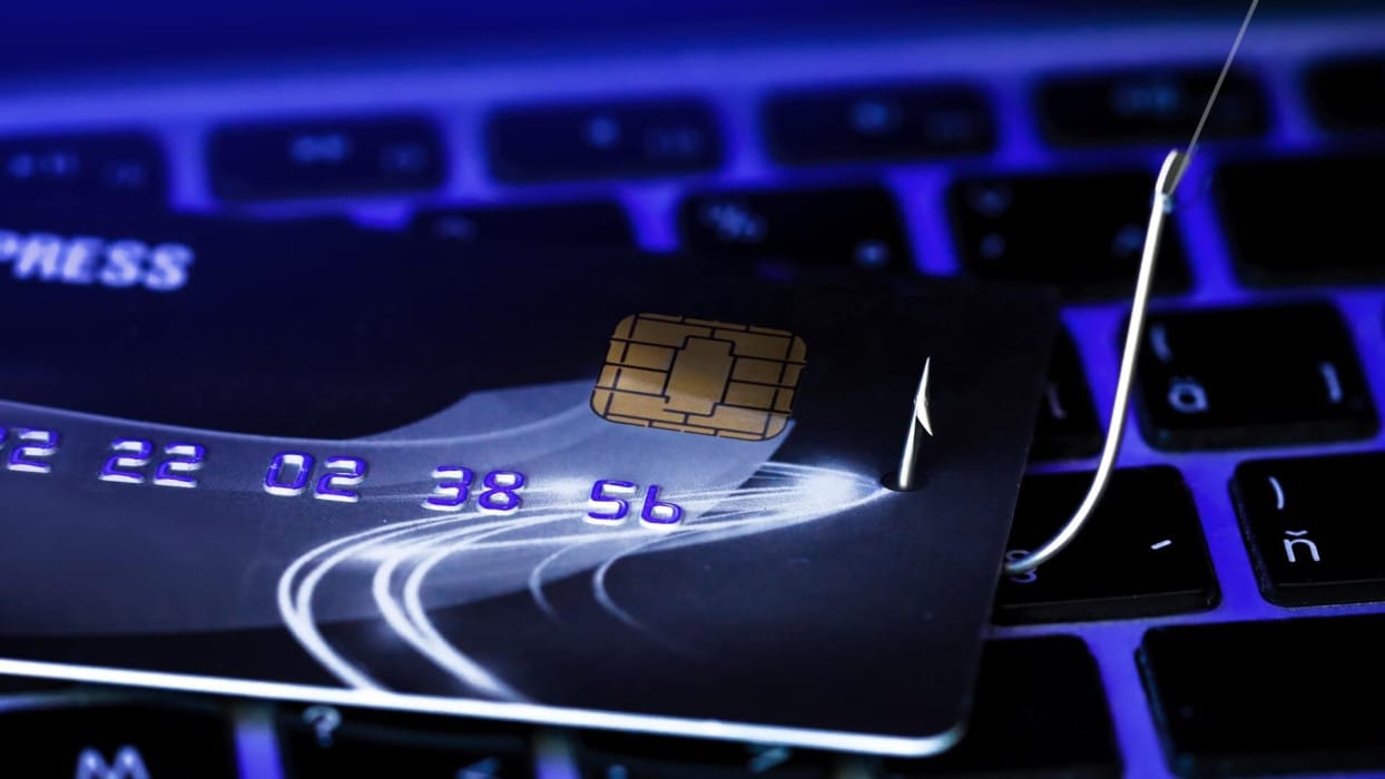 A dangerous hacker creating a bank data breach warning online