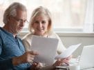 A happy senior couple celebrating the Social Security increase news