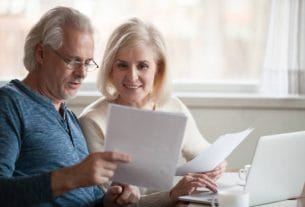 A happy senior couple celebrating the Social Security increase news