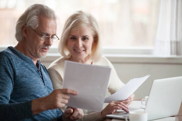 A happy senior couple celebrating the Social Security increase news