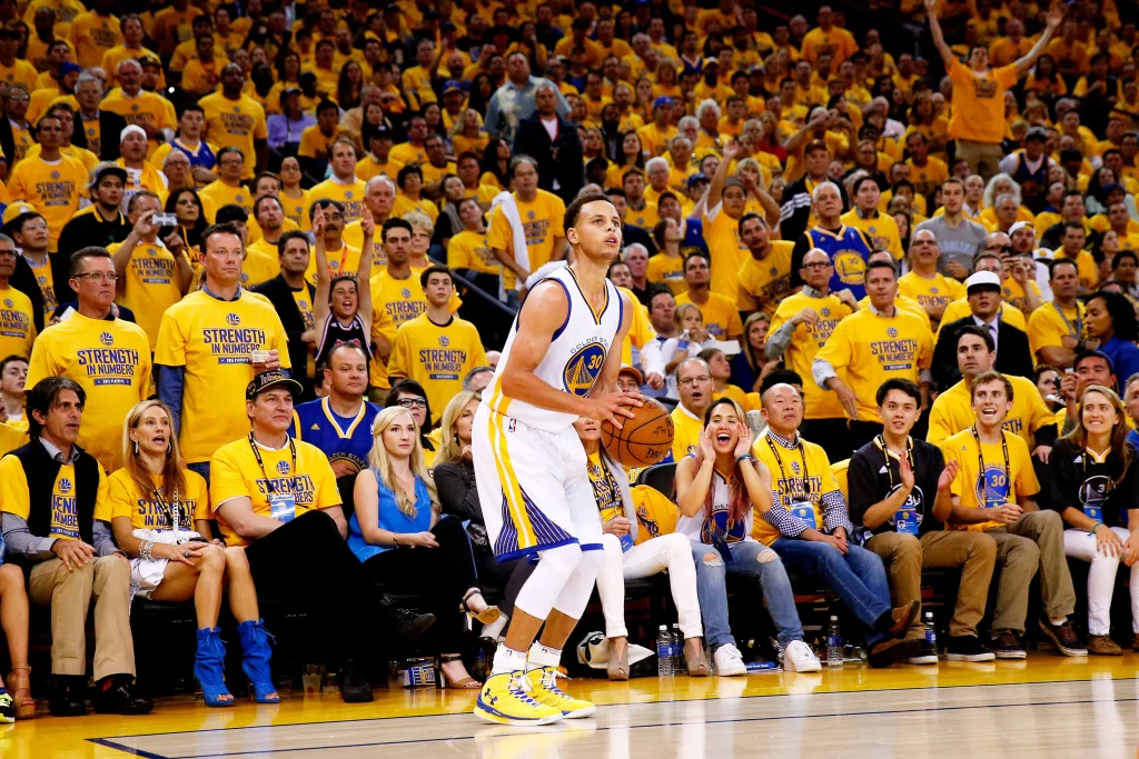 A player hitting a crucial three-pointer during the Wembanyama Knicks Game 3 victory today