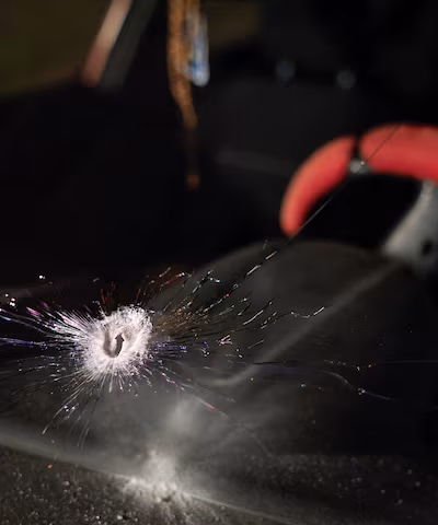 A bullet hole in a car window showing the tragic West Bank baby shooting incident today