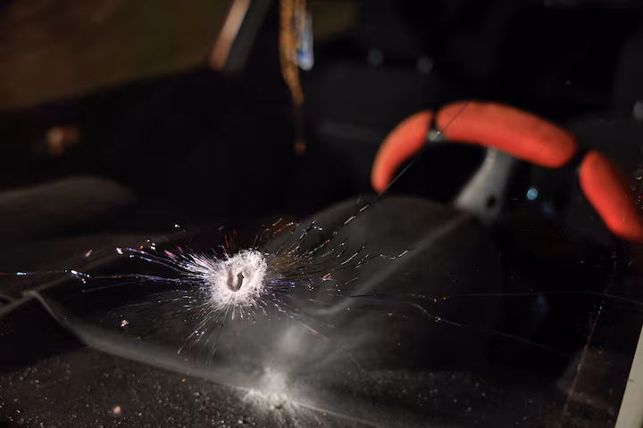 A bullet hole in a car window showing the tragic West Bank baby shooting incident today