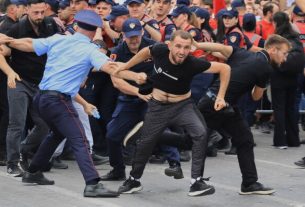 Protesters tearing down fences during the Albanian coastal development protests today
