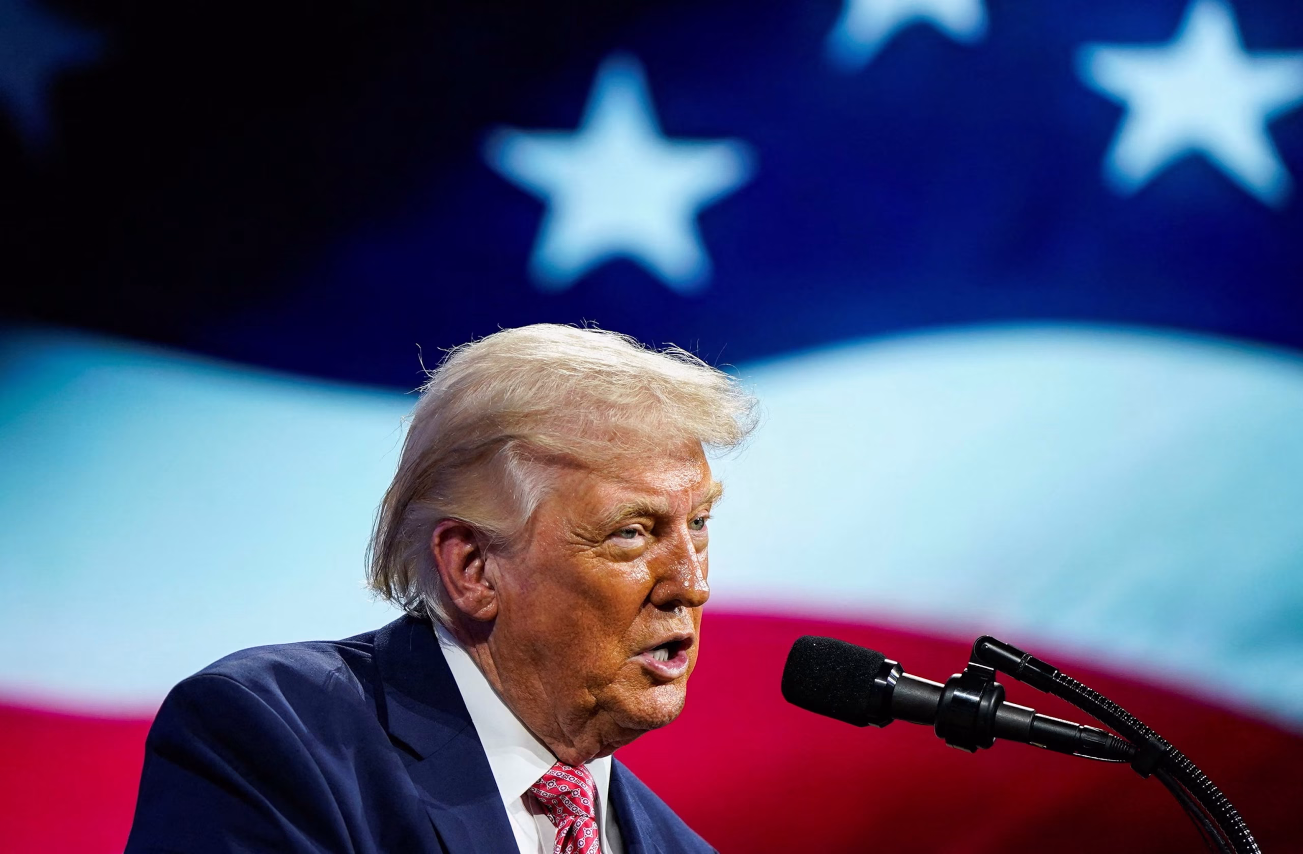 Donald Trump endorsing the Ken Paxton Senate race campaign during a massive political rally today